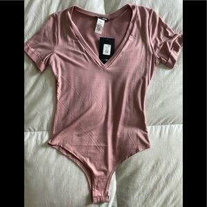 Brand new mauve bodysuit